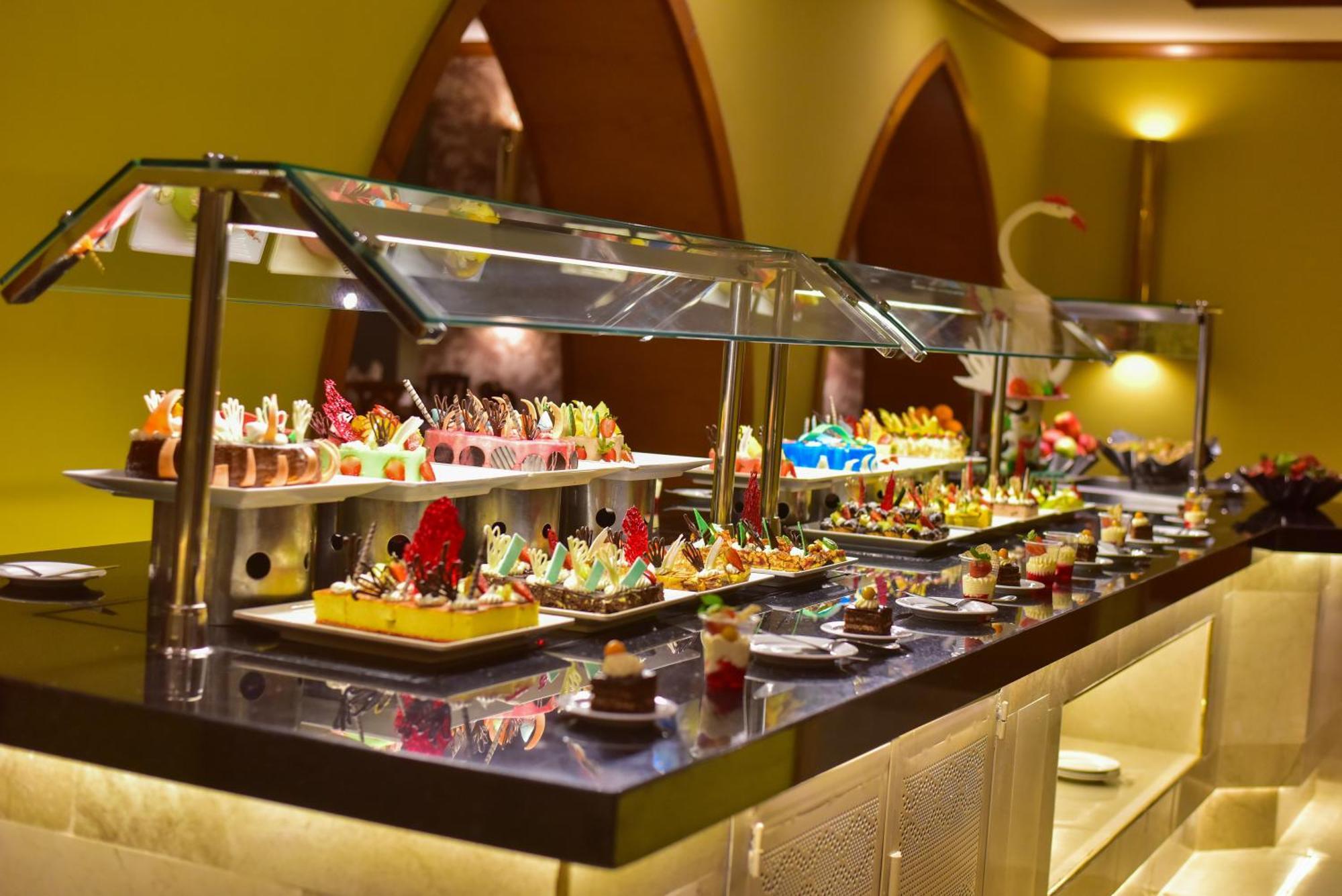 The Grand Hotel Sharm El Sheikh Exteriör bild A dessert buffet